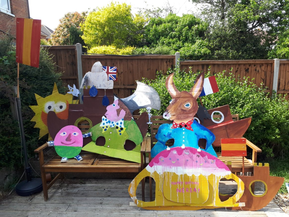 a selection of giant puppets with holes for glove puppets